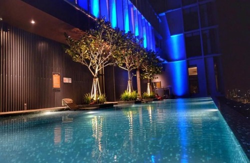 Titiwangsa Apartamento | Suite Deluxe King con vistas al jardín 7