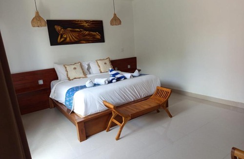 Mambal Casa | Deluxe Room Puri Uma Dewi room only