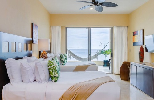 Mismaloya Complejo | Deluxe Room Unparalleled ocean views from suite’s private terraces