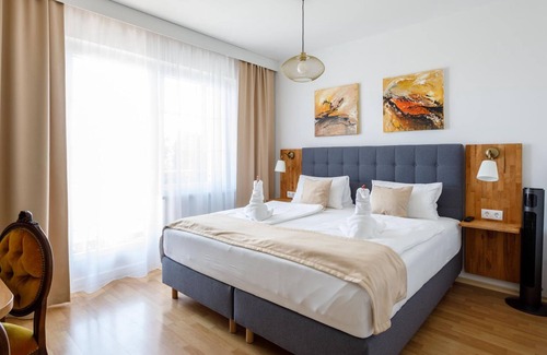 Morbisch am See Cabaña | Deluxe Suite mit Kingsize Bett, 2 Schlafräume - Pension Laubenhof