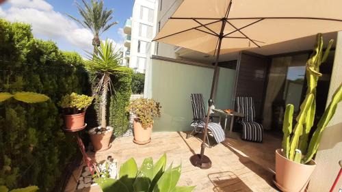 Les Deveses Apartamento | Denia Beach Suite with pool, sun terrace and tennis court