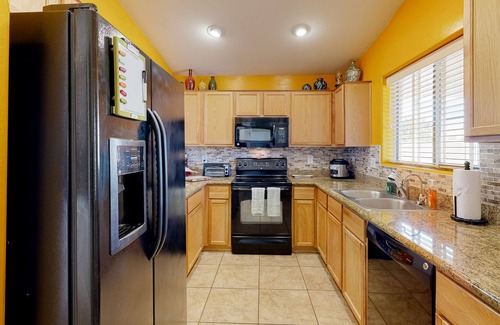 Power Ranch Casa | Desert oasis with an enclosed yard, firepit, washer/dryer, and central AC