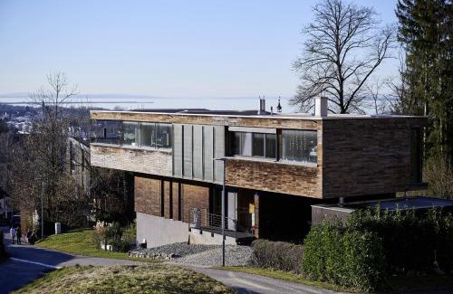 Bregenz Apartamento | Design Apartment mit Panoramafenster & Naturblick - KLIMATISIERT