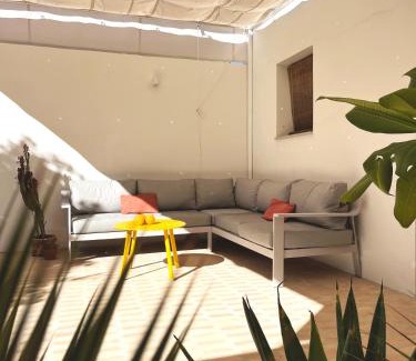 Carrion De Los Cespedes Apartamento | Design & art, patio with orange tree, near Seville