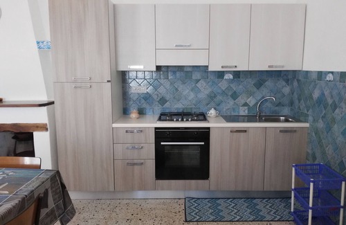 Dorgali Casa | casa unifamiliar, rodeada de vegetación con vistas al mar