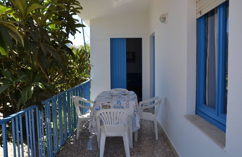 Dorgali Casa | casa unifamiliar, rodeada de vegetación con vistas al mar
