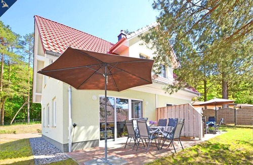 Korswandt Casa | DHH Waldhaus 6 - Gemütliche DHH für 5 Personen mit Kamin und Sauna/ Wlan, Stellplatz, Wama