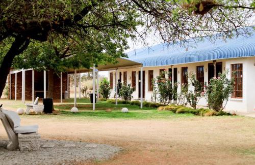 Maquassi Hills Casa | Die Geel Huis Guesthouse