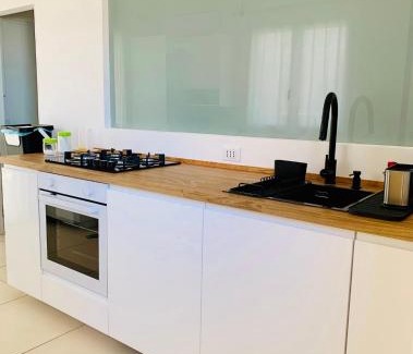 Scoglitti Apartamento | DIECI E modern sea apartment