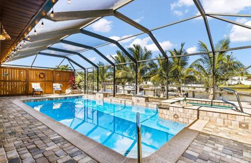 Fort Myers Villa | Direct Access Waterfront Villa with Heated Pool & Spa Edgewater Escape Roelens Vacations