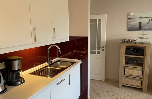 Wyk auf Foehr Apartamento | justo en la playa, balcón con vistas al mar, silla de playa, cerca del campo de golf