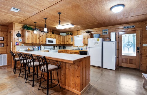 Sabinal Casa | Directly ON the Frio River with exclusive river frontage, shuffleboard table & room for 25 guests