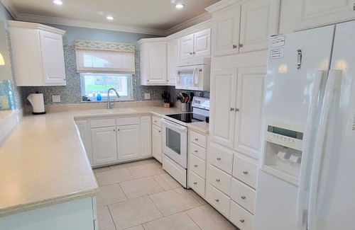 Cocoa Beach Casa | "Dive Into Fun! Spring & Summer Deals at Dolphin Cove – Walk to It All!"