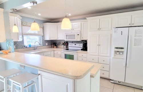 Cocoa Beach Casa | "Dive Into Fun! Spring & Summer Deals at Dolphin Cove – Walk to It All!"