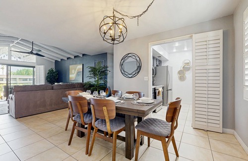 Baristo Condominio | Dive into Palm Springs fun with a stylish home base featuring poolside lounging.