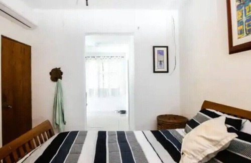 Islote Apartamento | DK Back Yard Surf Shack