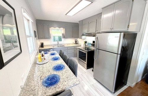 North Shore Casa | Dock Days- Deep water and fantastic wide water views. Volley Ball and horseshoe competitions await.