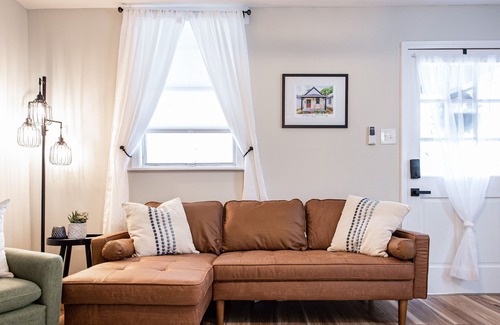 New Albany Casa | Dog-friendly 1920s charmer with bohemian finishes, firepit, central air, and W/D