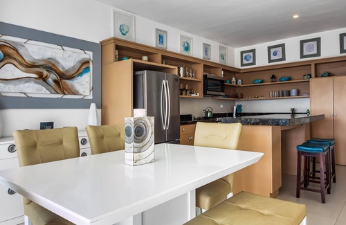 La Paloma Casa | Dog-friendly beachfront villa with pool & hot tub access plus rooftop deck