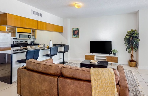 Edgewater Apartamento | Dog-friendly condo with balcony, pool, & partial ocean view - walk to beach
