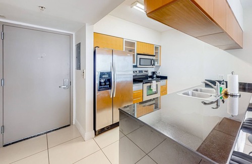 Edgewater Apartamento | Dog-friendly condo with balcony, pool, & partial ocean view - walk to beach