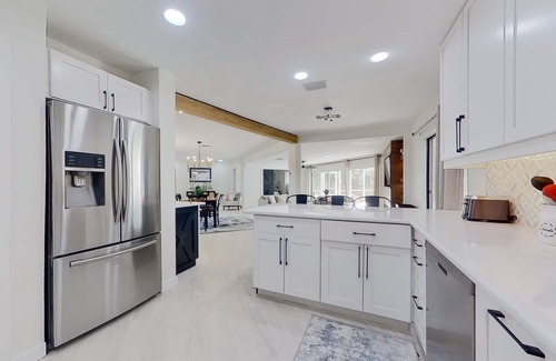 Fort Myers Casa | Dog-friendly home with private pool, dock, fireplace, patio, grill, & canal view