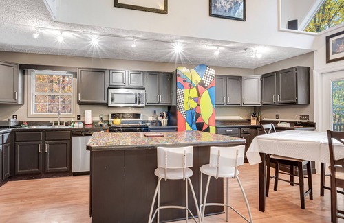 Mill Spring Cabina | Dog-friendly home with deck, shuffleboard, firepit - close to outdoor activities