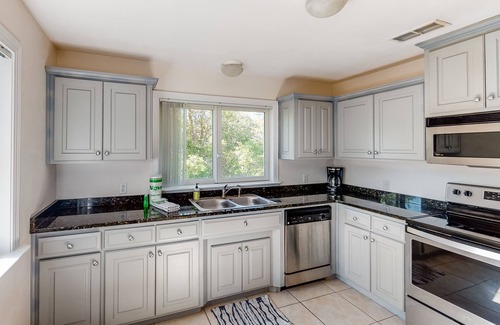 Eastpoint Casa | Dog-friendly home with lovely water view, roomy deck, fast WiFi, central AC, W/D