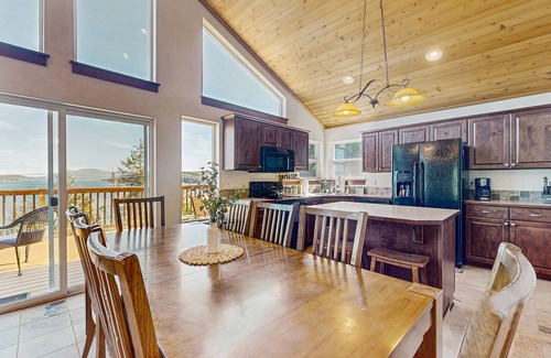 Coeur d'Alene Casa | Dog-friendly home with water views, deck, grill, wood stove, & private W/D