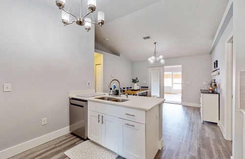 Palmetto Casa | Dog-friendly home with a private pool, home theater, sunroom, & washer/dryer
