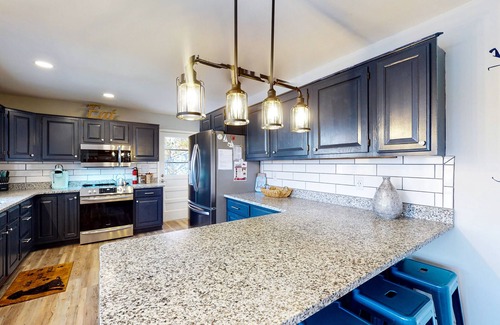 Huddleston Casa | Dog-friendly lakefront home with hot tub, dock, kayaks, & game room