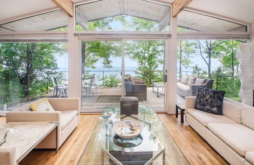 Harbert Casa | Dog-friendly lakefront house with private hot tub, outdoor pool, beach, WiFi