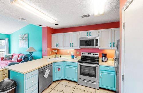 East End Casa | Dog-friendly, poolside townhouse w/community pool, grills, deck, beach gear, AC