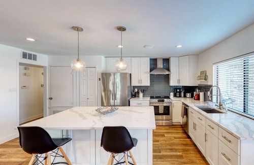 The Colony Casa | Dog-friendly remodeled home with full kitchen, outdoor pool, & arcade games