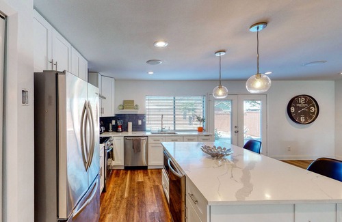 The Colony Casa | Dog-friendly remodeled home with full kitchen, outdoor pool, & arcade games