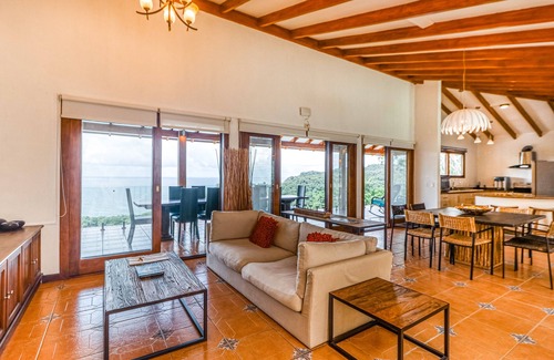 La Cruz Casa | Dog-friendly retreat with sea views, perfect location, & covered terrace