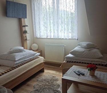 Rzyki Apartamento | Dom Wakacyjny Gajówka z ogrodem