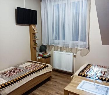 Rzyki Apartamento | Dom Wakacyjny Gajówka z ogrodem
