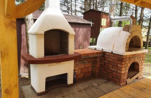 Rybno Cabina | Domek nad jeziorem Rumian