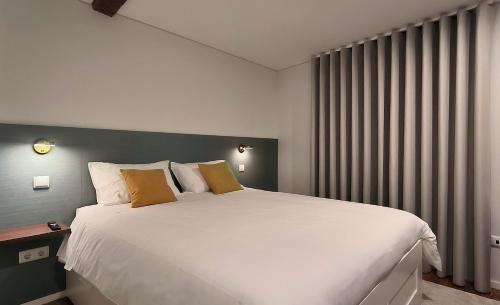 Guimaraes Casa | DOMI Suites & Studios