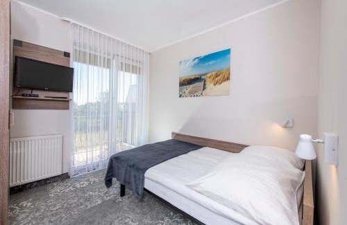 Gaski Cabina | Domki, Apartamenty i Restauracja Włóczęga