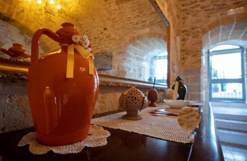 Carovigno Casa | DOMUS CESARE - dimora storica totalmente in pietra nel cuore del centro storico con cabina doccia pietra in camera e zona relax esterna-historic residence entirely made of stone in the heart of the historic center with stone shower cabin in the room