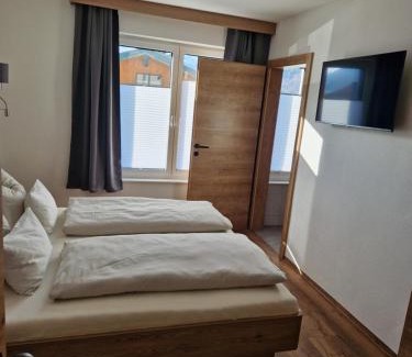 Alpendorf Casa | Doppelzimmer Deutschmann