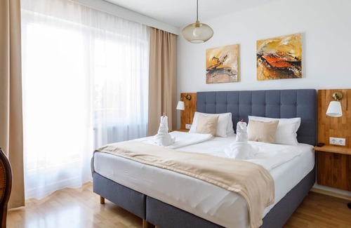 Morbisch am See Cabaña | Doppelzimmer mit Boxspringbett - Pension Laubenhof