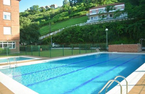 Suances Apartamento | Dos habitaciones Coqueto y cómodo apartamento con piscina y padel