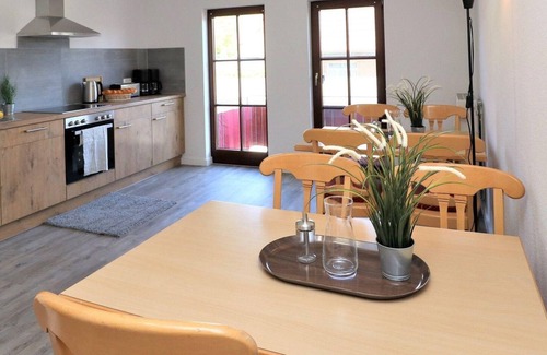 Ostseebad Wustrow Apartamento | Double room with balcony and Bodden view directly at the harbor of Wustrow