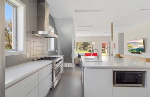 Douglas Casa | Douglas Modern Villa - Steps to downtown | Game RM | Backyard Oasis