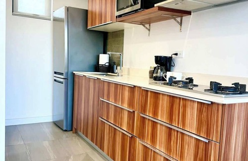 Zona Río Condominio | Downtown 1 BR Suite in Av Revolucion Tijuana