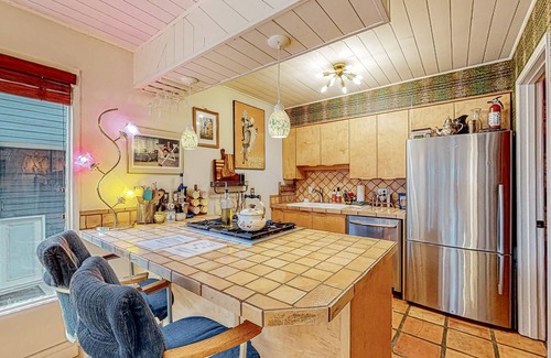 South Addition Apartamento | Downtown, art-filled apartment with fireplace, balcony, & well-equipped kitchen