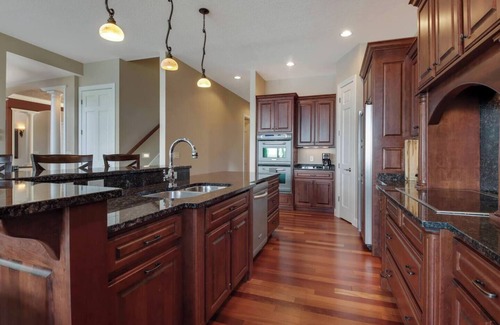 Chetek Casa | Downtown Lakefront Home on Lake Chetek w/hot tub & pontoon & jet ski rental